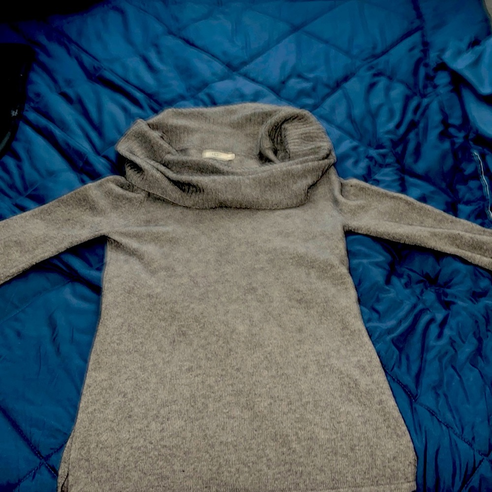 This is an XL grey turtleneck UGG sweater.